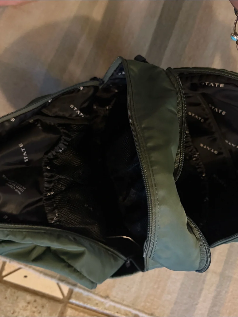 STATE buckles pocket